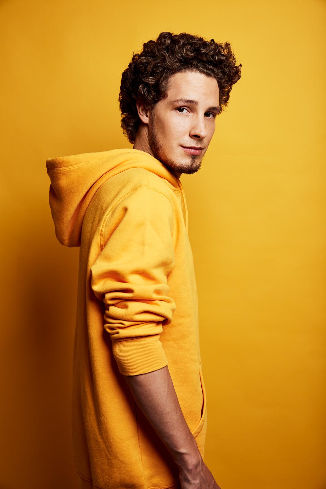 Maxim Schunk — Yellow Hoodie Side